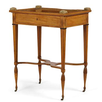 29. A late Gustavian mahogany table attributed to L. Qvarnberg (master in Stockholm 1801-13).