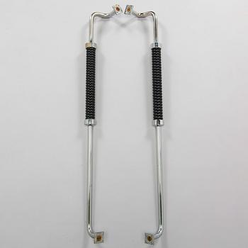 A pair of door handles from the mid-20th century.