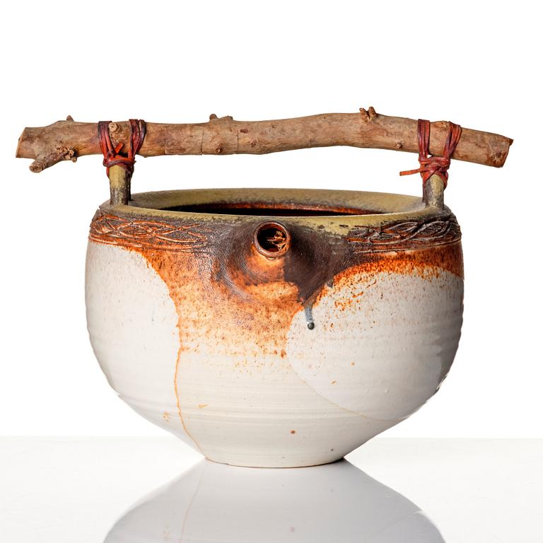 Iskandar Jalil, a stoneware vessel with wooden handle, Singapore 1970s-80s.