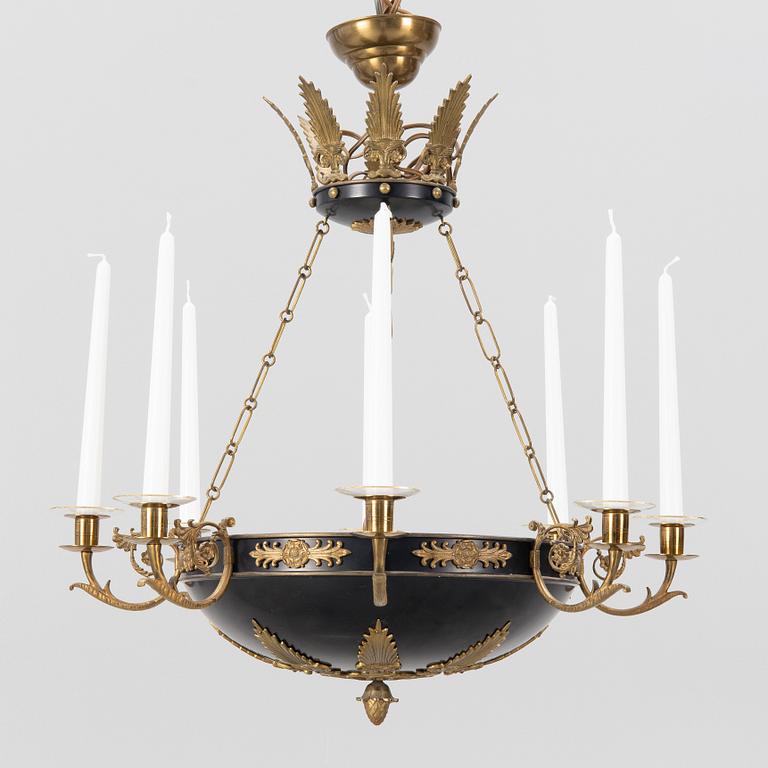 An Empire style ceiling light, around the year 1900.