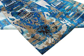 An oriental carpet, c. 356 x 261 cm.