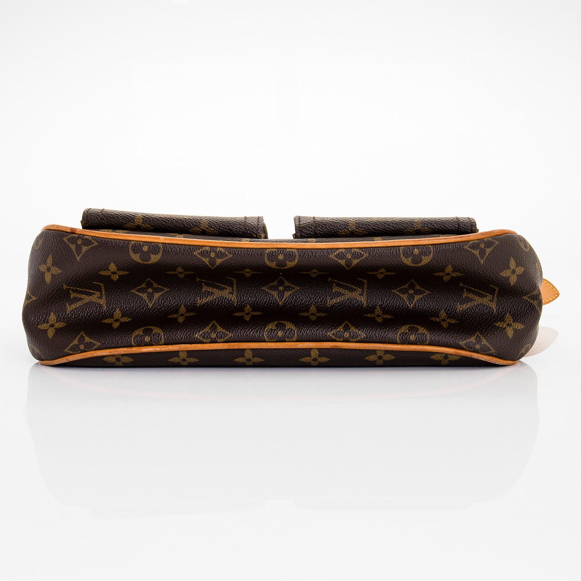 Louis Vuitton, a Monogram Canvas 'Hudson GM' bag.