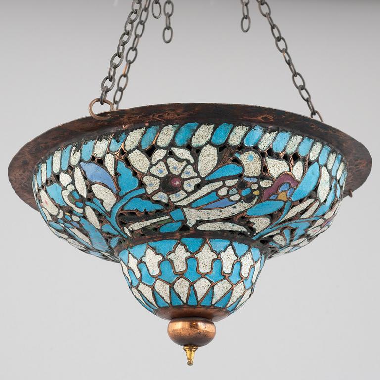 An enamelled metal lamp, Qajar dynasty (1789–1925).