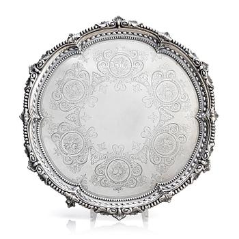 320. A sterling silver salver, mark of Martin, Hall & Co (Richard Martin & Ebenezer Hall), London 1881.