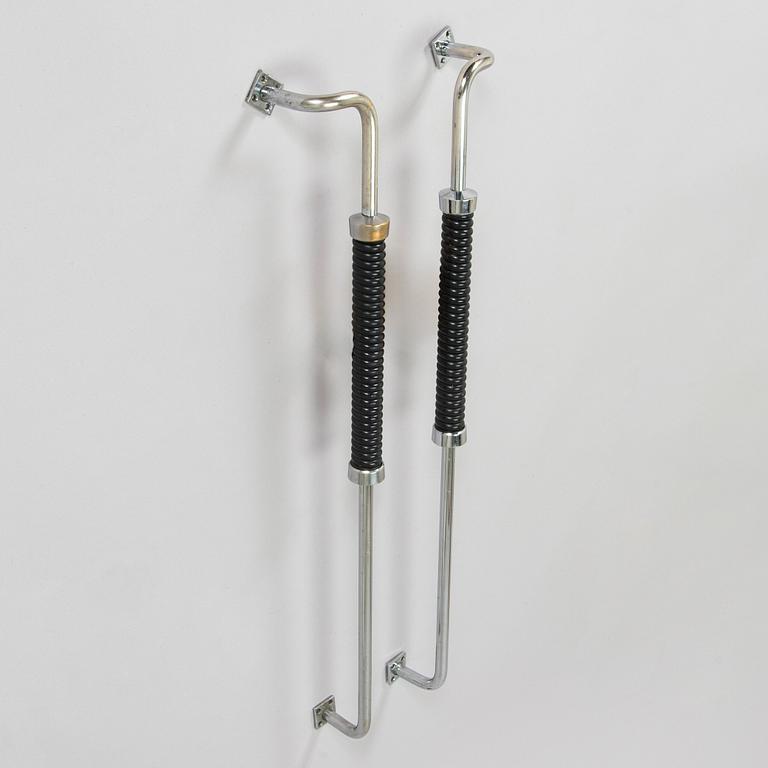 A pair of door handles from the mid-20th century.