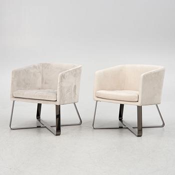 Andrea Parisio, a pair of "Lolyta" armchairs, and a "Pek" side table, Meridiani, Italy, contemporary,.