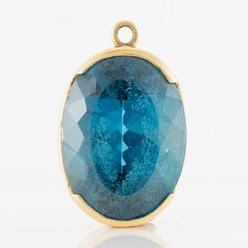 Pendant, gold with blue topaz.