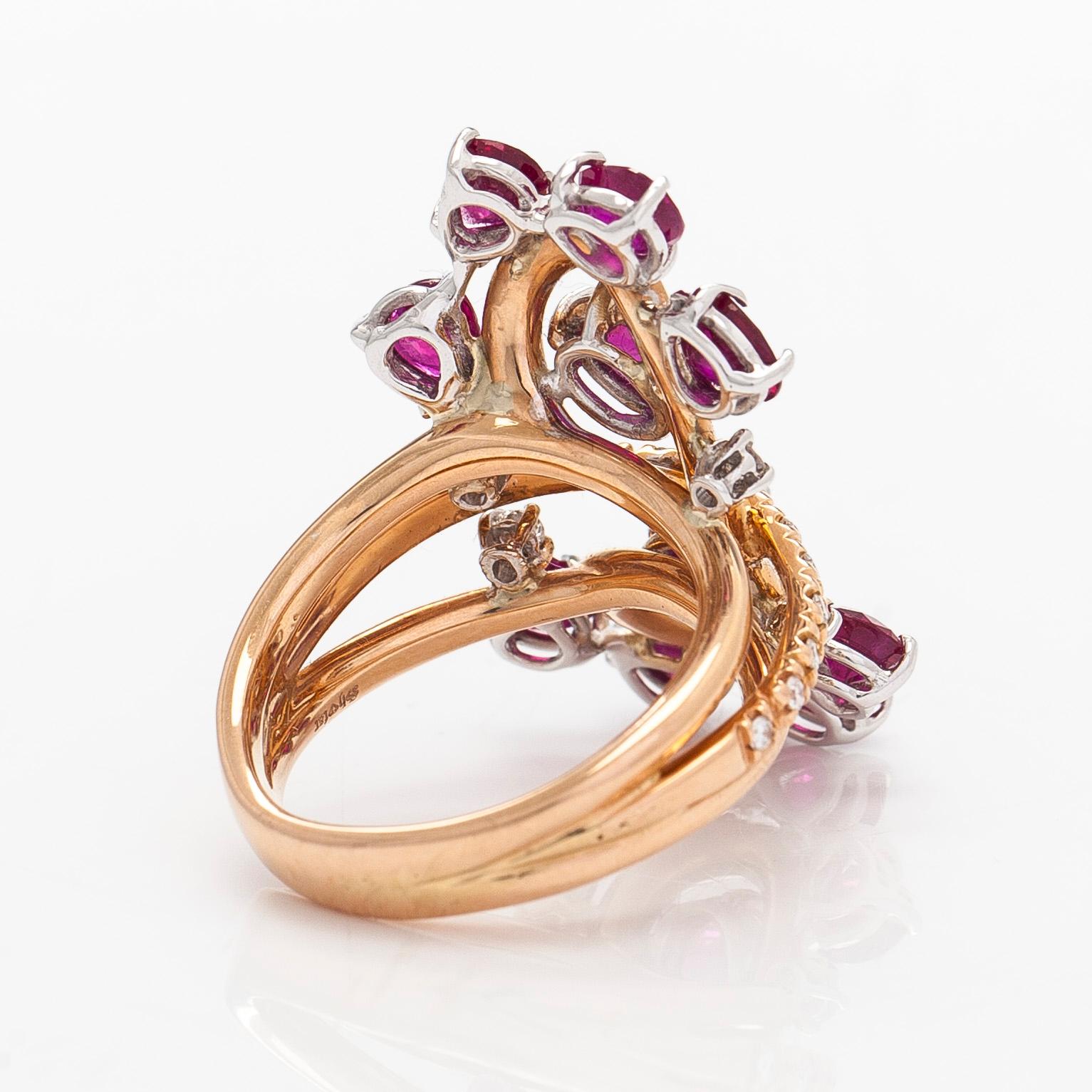 Ring, 18K rose gold with oval- and pear-cut rubies and brilliant-cut diamonds.