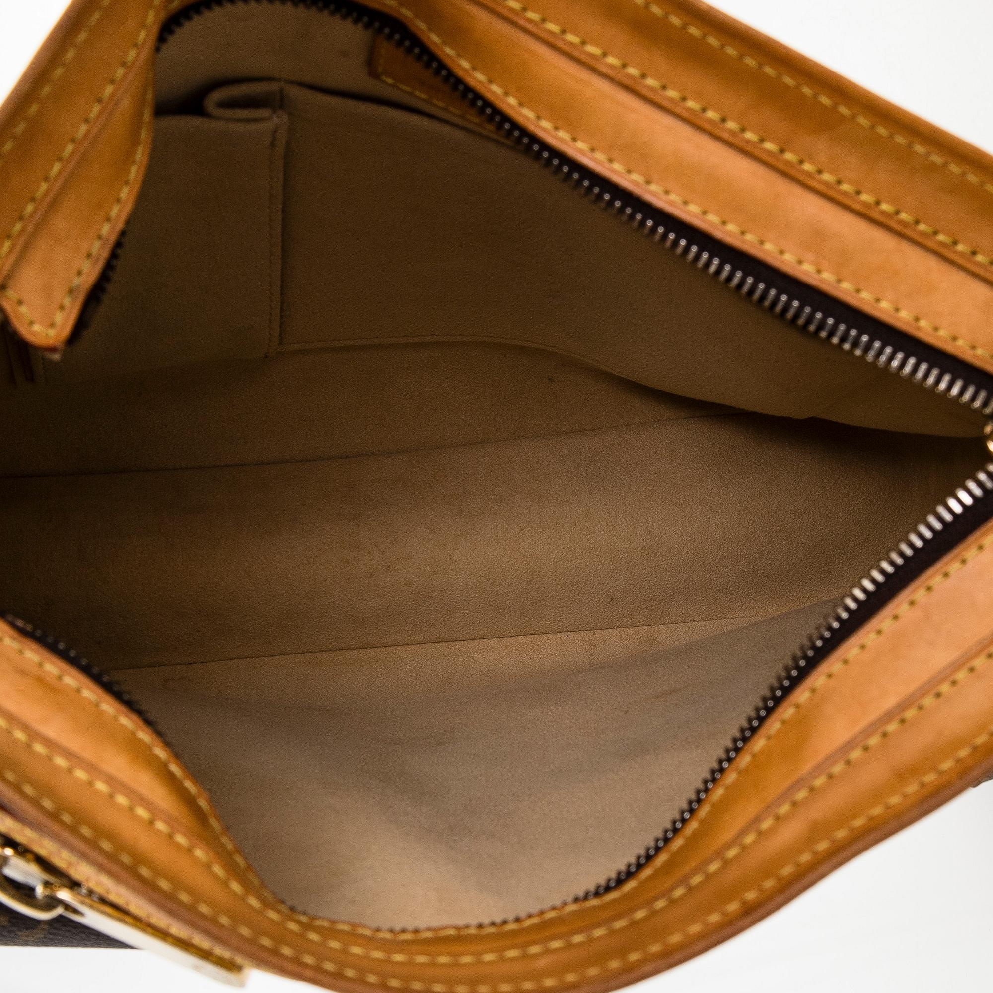 Louis Vuitton, a Monogram Canvas 'Hudson GM' bag.