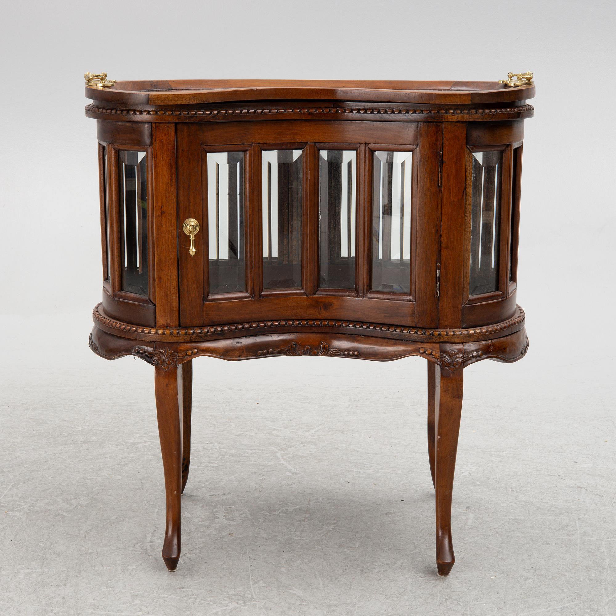 A display cabinet/bar cabinet, Indonesia, 20th century.