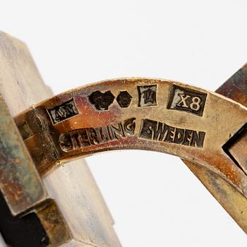 Wiwen Nilsson, ett par manschettknappar och ett par skjortknappar, förgyllt silver med onyx med monogram på sidan, Lund 1948.