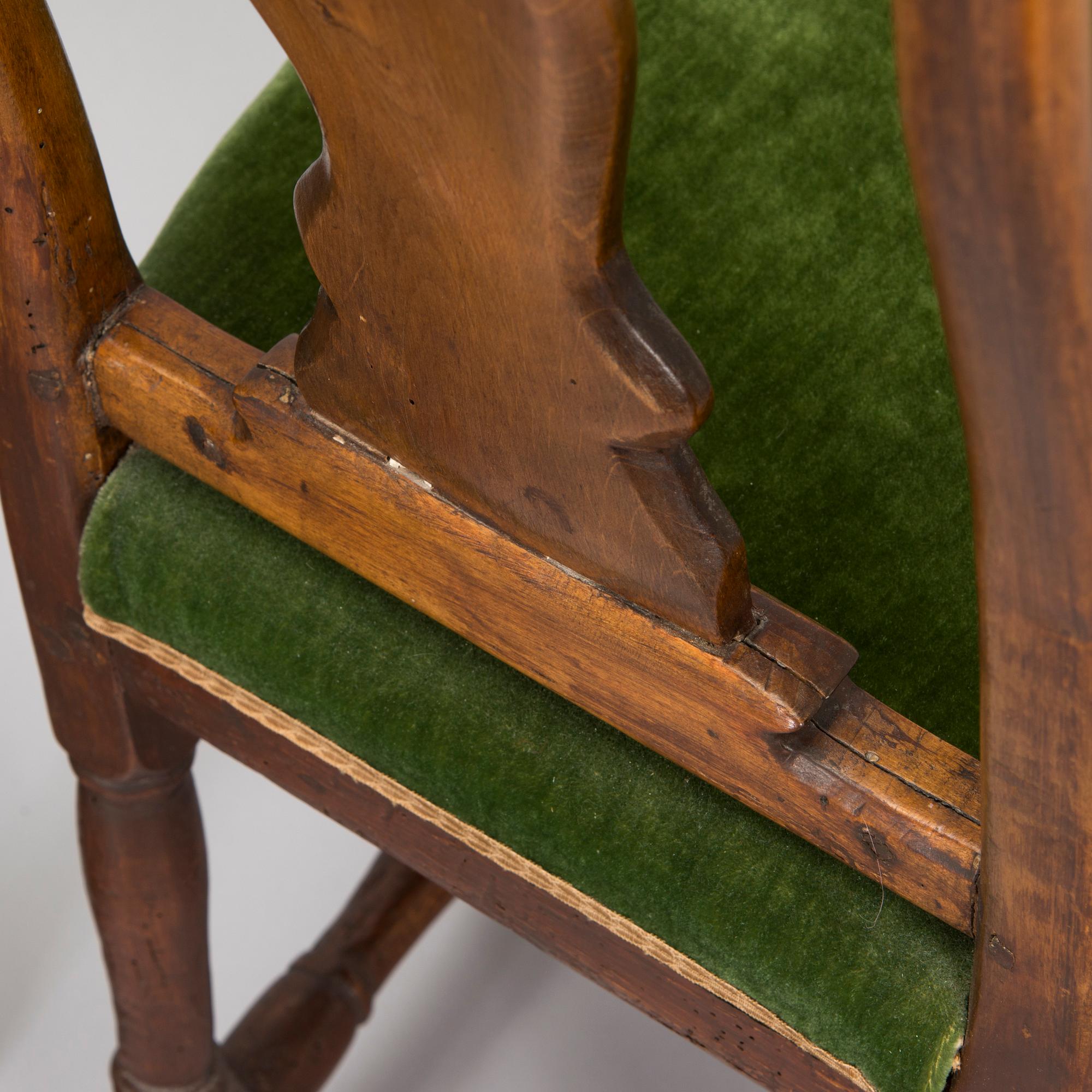 A matched set of four 18th century chairs.