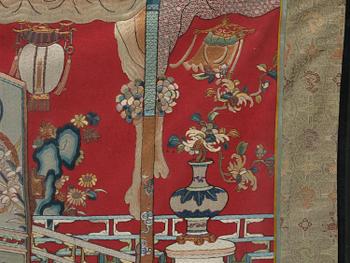 A red panel embroidered with silk, Qing dynasty, 19th century.