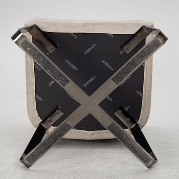 Andrea Parisio, a pair of "Lolyta" armchairs, and a "Pek" side table, Meridiani, Italy, contemporary,.