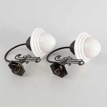 A pair of Jugend-style wall lights, mid20th century.
