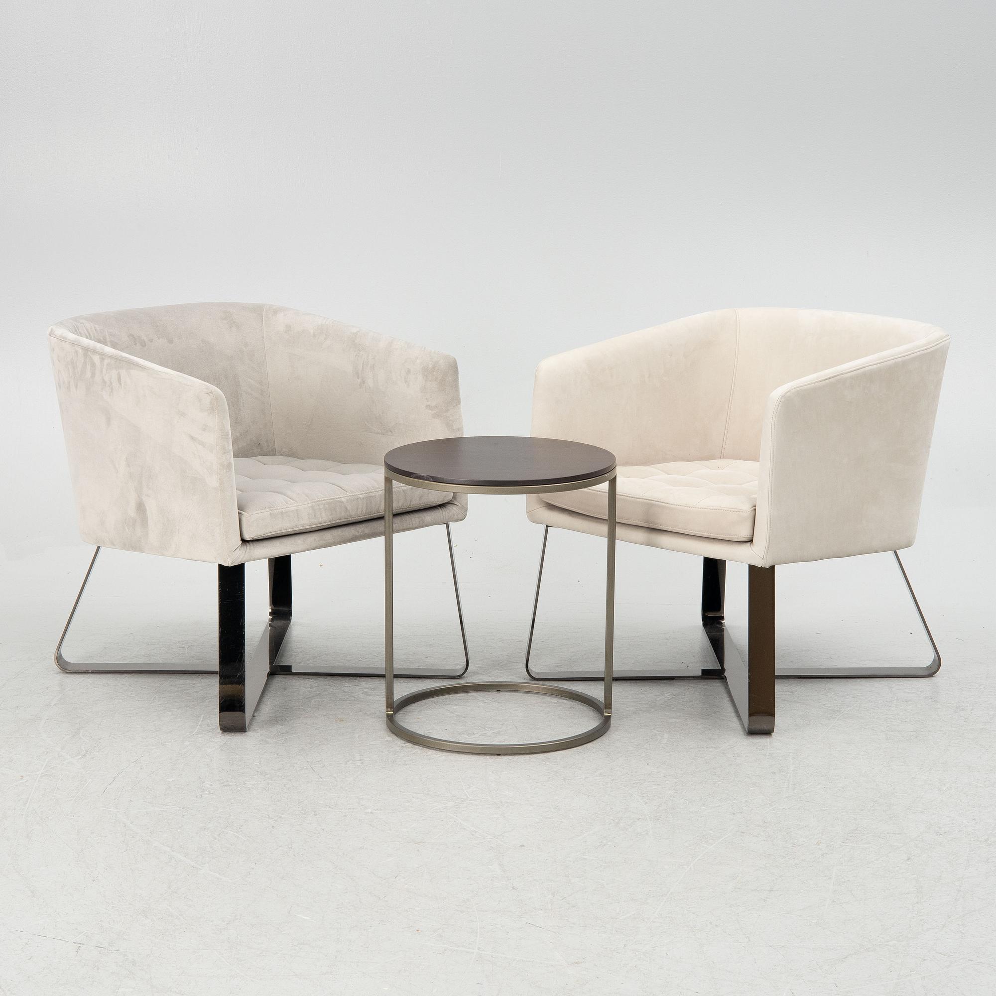 Andrea Parisio, a pair of "Lolyta" armchairs, and a "Pek" side table, Meridiani, Italy, contemporary,.