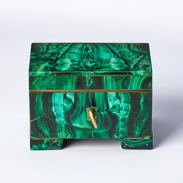 A Russian Nicolas II malachite-veneered box, circa 1900.
