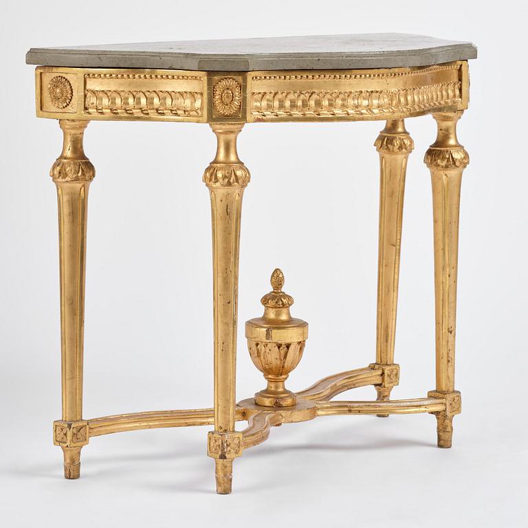 A Gustavian giltwood and limestone-top console table, Stockholm, late 18th century.