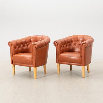 Armchairs, a pair by Ehrlin, later part of the 20th century.