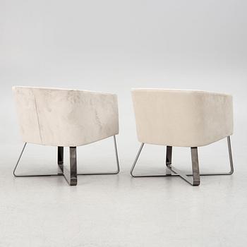 Andrea Parisio, a pair of "Lolyta" armchairs, and a "Pek" side table, Meridiani, Italy, contemporary,.
