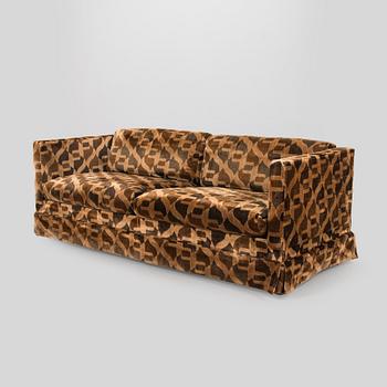 A 1970s sofa for Skanno, according to given information.